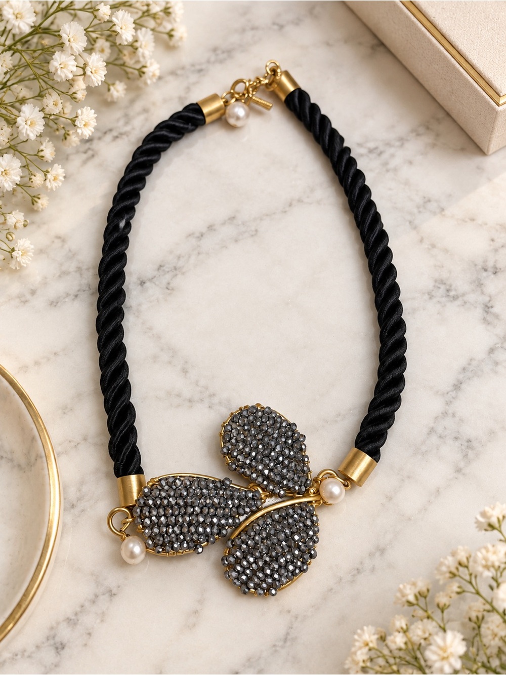 Gold-Tone Black Rope Necklace with Gray Crystal Petal Pendant -